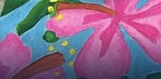 Paint and canvases on the table at a girls' paint night