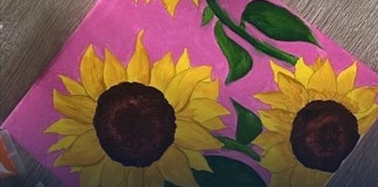 Brushes and canvases at a MYSisters paint night