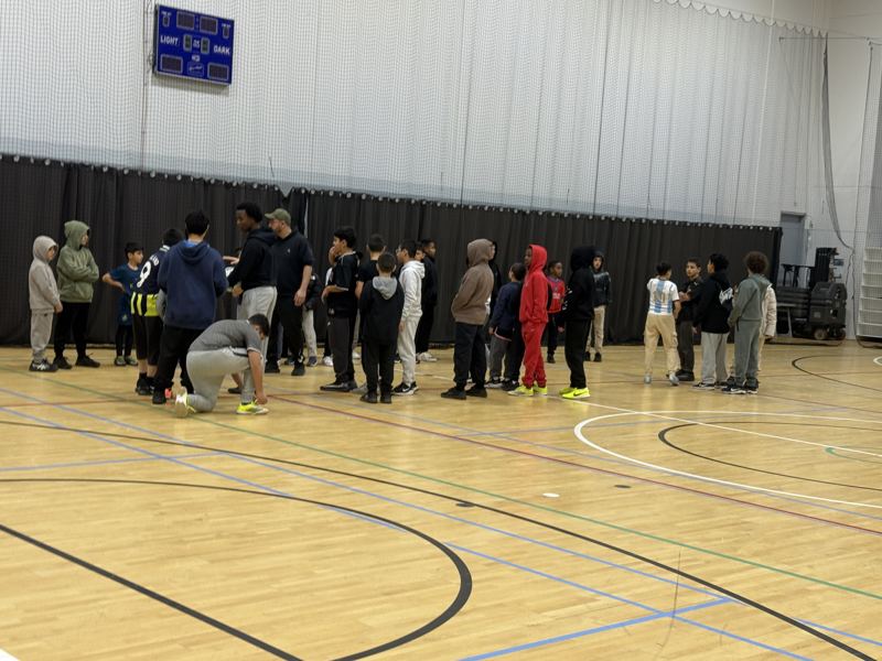 Teams getting ready on the court before a game